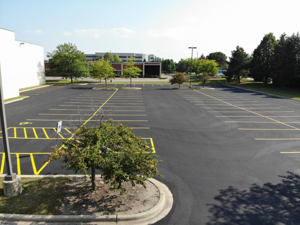 Parking lot with fresh asphalt and lines